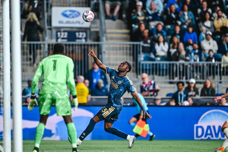 The Union's Ezekiel Alladoh follows the flight of the ball during the draw Saturday with D.C. United at Subaru Park.