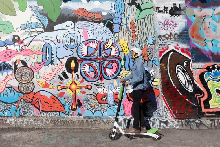 An electric scooter from Lime, one of several companies crowding into cities around the country, often without permission.