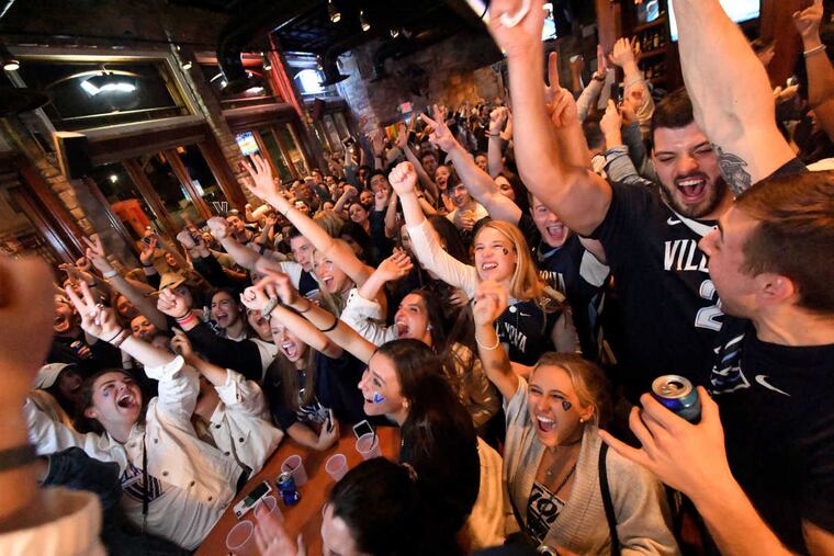 Villanova fans react as they watch the televised NCAA national championship game final against Michigan at Villanova's Connelly Center on Tuesday, April 2, 2018.