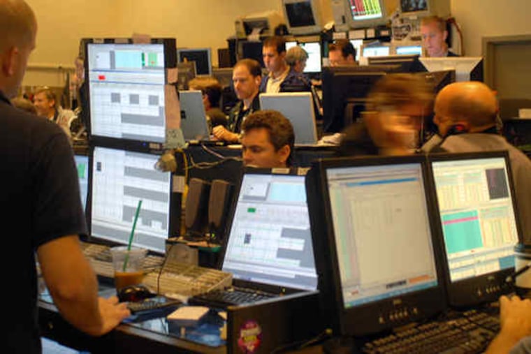Traders at the old Philadelphia stock exchange, now owned by Nasdaq.