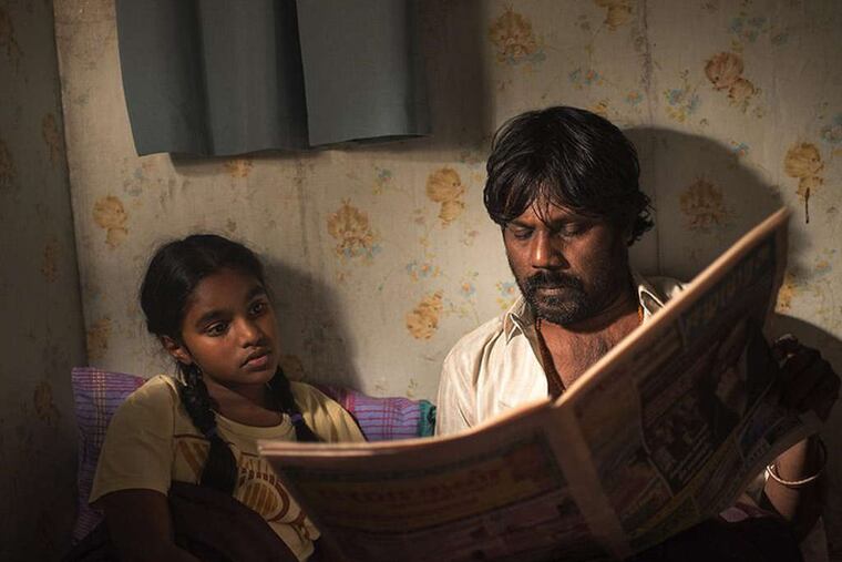 "Dheepan," about a Tamil Tiger who leaves Sri Lanka and settles in Paris with a makeshift family of refugees, took the first-prize Palme D'Or (the Golden Palm), at the Cannes Film Festival on Sunday.