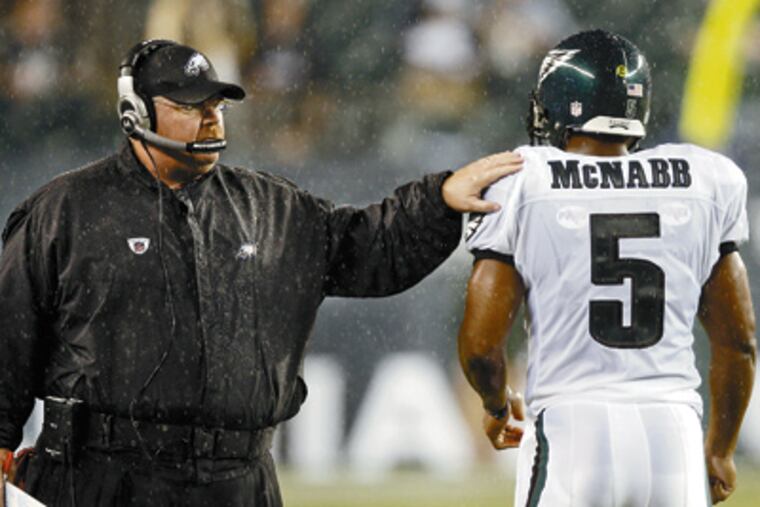 Eagles coach Andy Reid and quarterback Donovan McNabb have had a great run together, making it to four NFC title games and one Super Bowl. (David Maialetti / Staff Photographer)