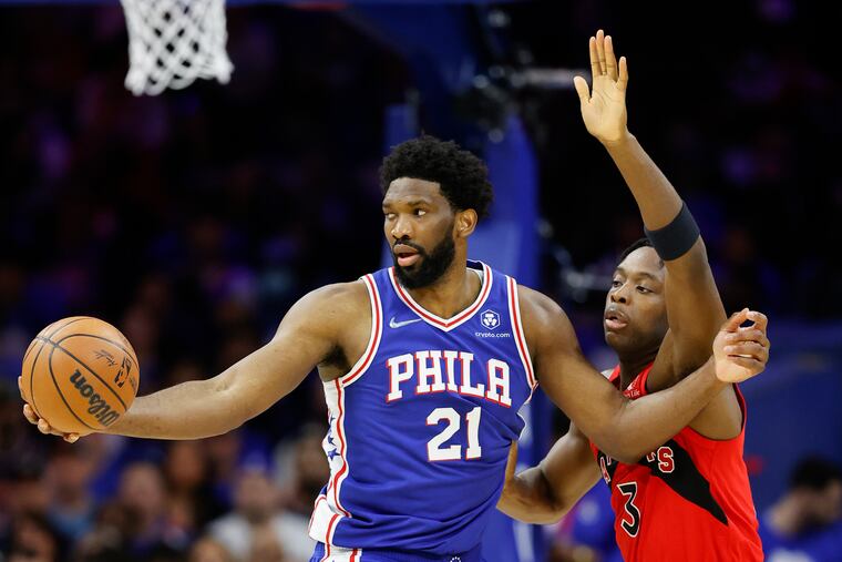 Sixers center Joel Embiid is guarded by Raptors forward OG Anunoby during Game 1.