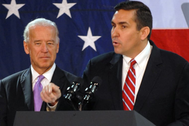 Vice President Joe Biden (left) waits to be introduced by Bryan
Lentz (right) during a campaign rally at the Radnor Sulpizio Gym
on Wednesday. (Tom Gralish / Staff Photographer)
