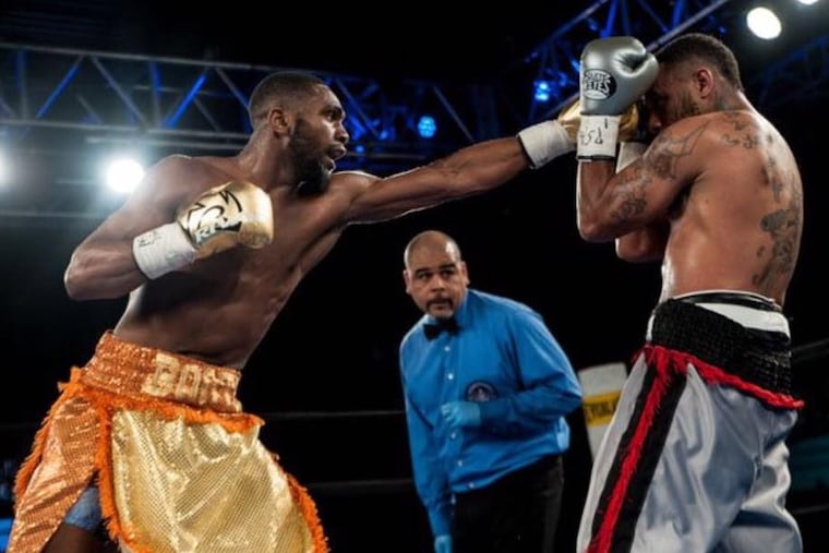 Philadelphia native boxer Jaron"Boots" Ennis, left, is set to fight on Friday.