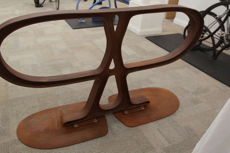 The "Pretzel" bike rack by Peter Everett Brown and Barbara Ann Sprague has thick loops that can challenge some bike locks, which is too bad, because the double "P" shape has potential in Philadelphia.
