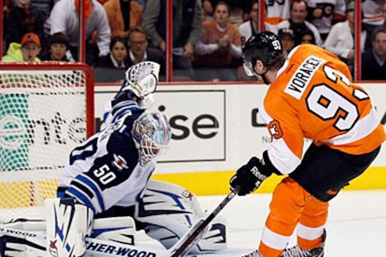 Flyers forward Jakub Voracek gets stopped by Jets goalie Chris Mason during Thursday's game. (Yong Kim/Staff Photographer)