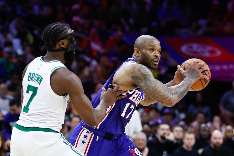 Sixers forward P.J. Tucker is guarded by Boston's Jaylen Brown during Game 4 of the Eastern Conference semifinals on Sunday.