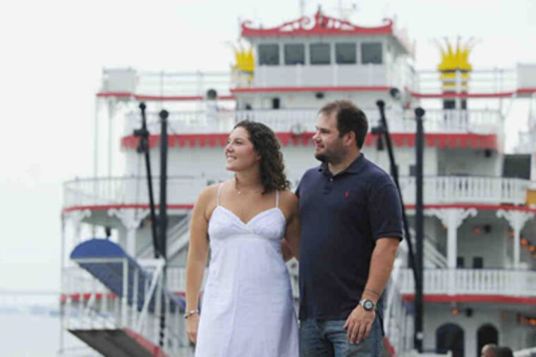 Brett Condon and Rob Zahorchak outside the Philadelphia Belle, aboard which they planned to wed. (Sarah J Glover / Staff Photographer)
