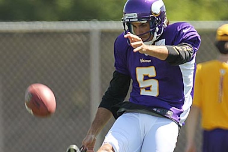 Vikings punter Chris Kluwe decided to cover the 50th Anniversary Hall of Fame patch on his jersey with a yellow Post-it Note that read: "Vote Ray Guy." (Genevieve Ross/AP file photo)