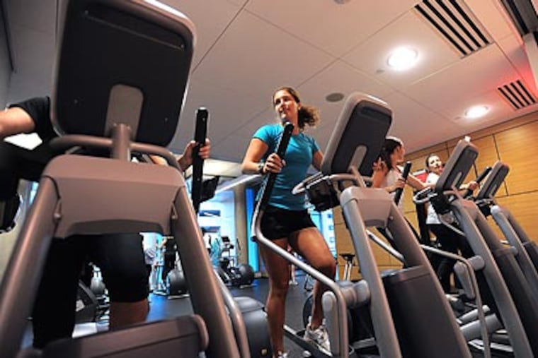 Don't grip the elliptical machine's rails too hard — it'll detract from your workout.