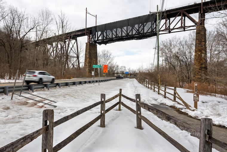 The Brandywine Valley Viaduct (colloquially referred to as the Downingtown Trestle Bridge or Downingtown High Bridge, and historically known as the Pennsylvania Railroad Freight Bridge) spans the East Branch Brandywine Creek and U.S. Route 322 near Downingtown Thursday, Feb. 12, 2026 Chester County purchased the conic bridge last year, and received a grant to make repairs.