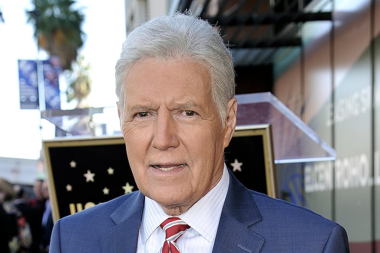 FILE - Alex Trebek, host of "Jeopardy!" attends a ceremony honoring the show's executive producer Harry Friedman with a star on the Hollywood Walk of Fame in Los Angeles, in this Friday, Nov. 1, 2019, file photo. “Jeopardy!” host Alex Trebek died Sunday.