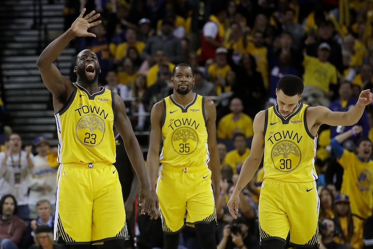 Golden State Warriors forward Draymond Green (23) wasn't pleased with the way Kevin Durant (23) handled his exit. (AP Photo/Jeff Chiu)