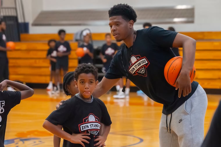 Temple University men's basketball sophmore guard Zion Stanford hosts a kids basketball camp at West Philadelphia High School, August 22, 2024.