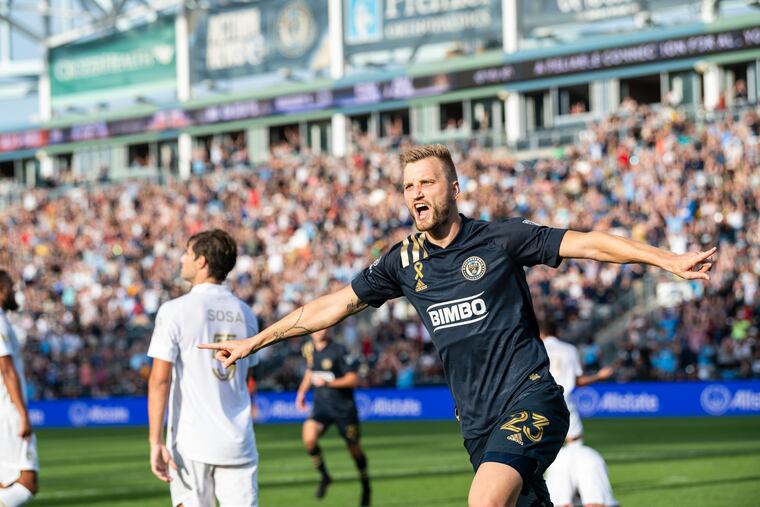 Kacper Przybylko (23) celebrates scoring his goal in the Union's win.