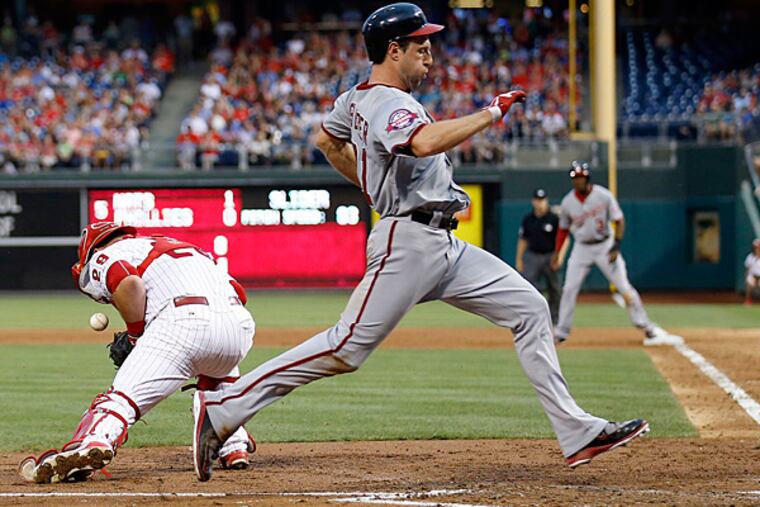 Nationals' Max Scherzer runs to home plate during a sacrifice fly past Phillies' catcher Cameron Rupp. (Yong Kim/Staff Photographer)