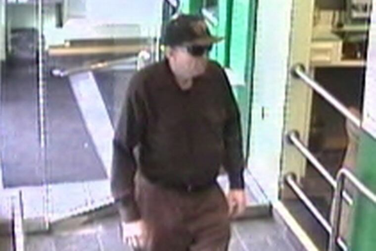 Camera at Citizens Bank shows over-60 man wanted for robbing the bank at 2001 Market St. yesterday. (Surveillance photo)