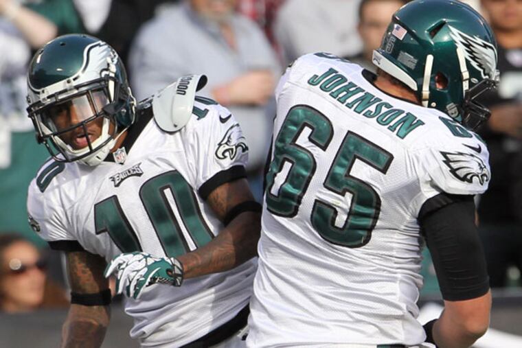 DeSean Jackson and Lane Johnson celebrate Jackson's touchdown reception against the Oakland Raiders. (Yong Kim/Staff Photographer)