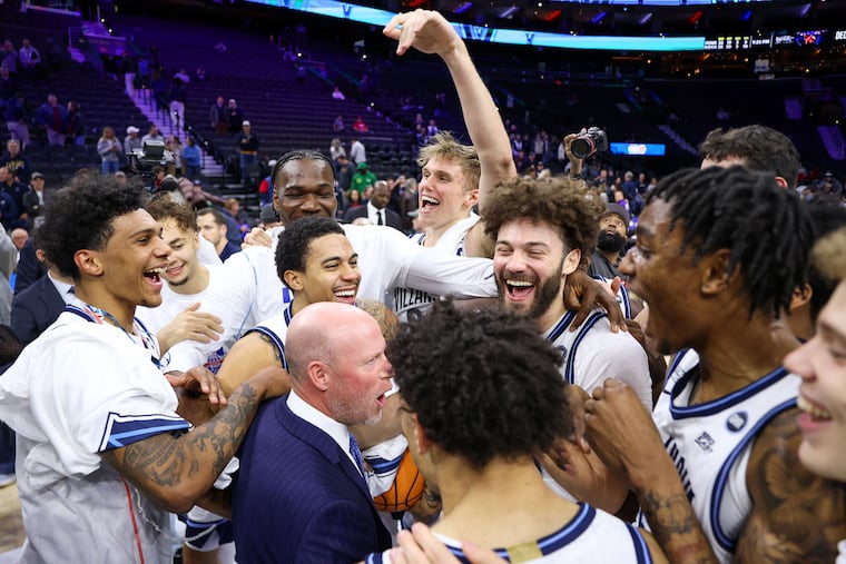 The Villanova Wildcats celebrate defeating the Penn Quakers, 90-63, in the Big 5 Men’s Basketball Championship at Xfinity Mobile Arena on Saturday, Dec. 6, 2025, in Philadelphia.