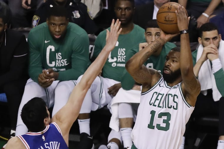 Boston Celtics forward Marcus Morris shoots over Philadelphia 76ers forward Ersan Ilyasova during Game 2 of their NBA playoffs series in Boston.