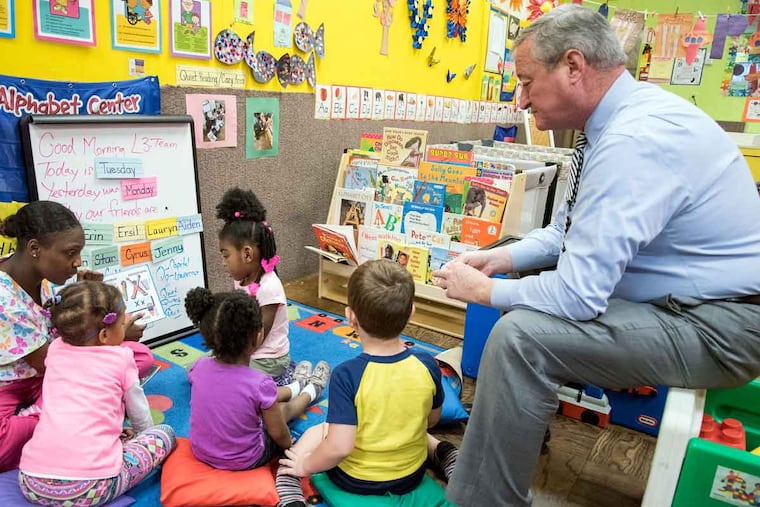 The mayor visits with tiny pupils at Little Learners Literacy Academy. The school hopes to improve its quality rating.
