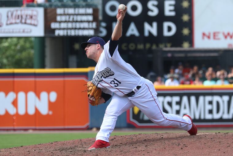 Phillies prospect Josh Tols pitching for the Lehigh Valley IronPigs.