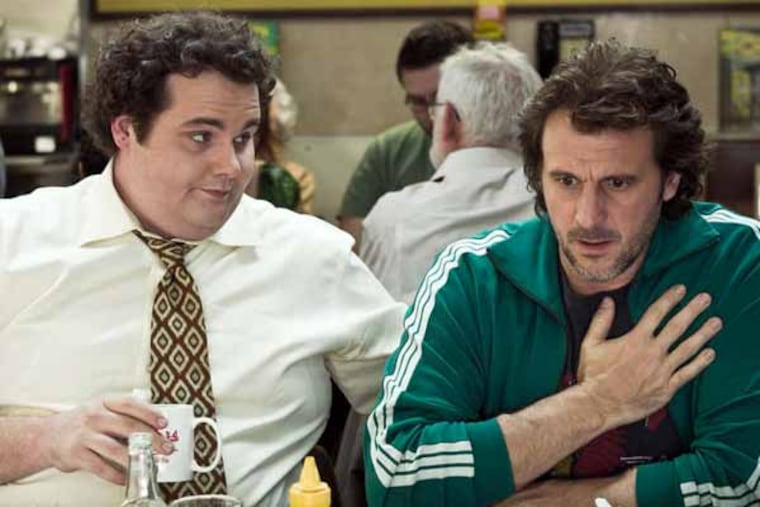 Antoine Bertrand (left) stars as "Avocat" and Patrick Huard (right) stars as "David Wozniak" in the upcoming release of Entertainment One's STARBUCK. © 2013 Entertainment One Films US