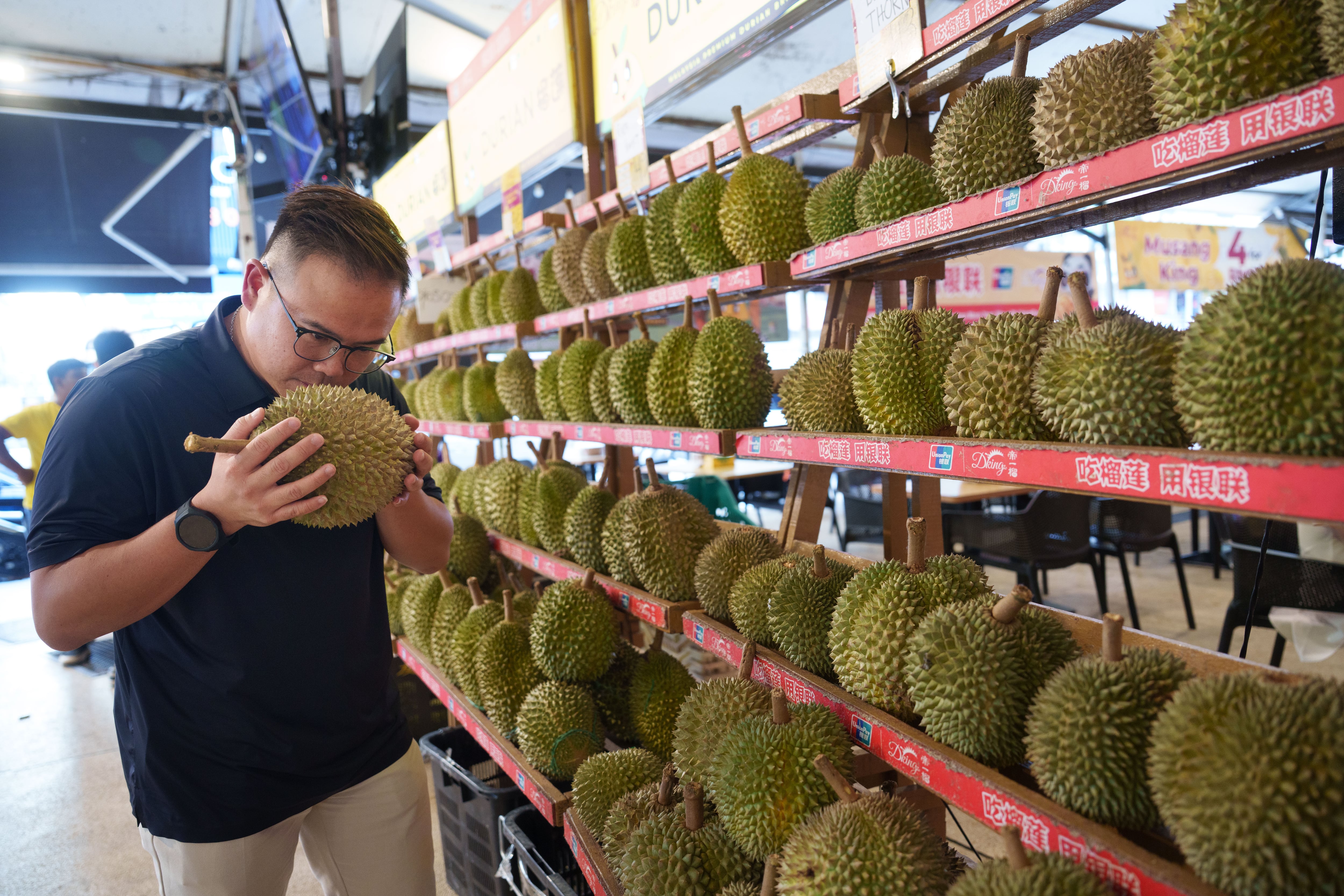 Malaysians' efforts to elevate durian industry, in photos