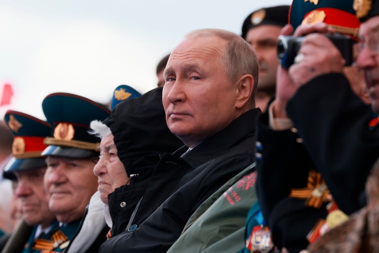 Russian President Vladimir Putin looks on during the Victory Day military parade marking the 77th anniversary of the end of World War II in Moscow, on Monday, May 9, 2022.