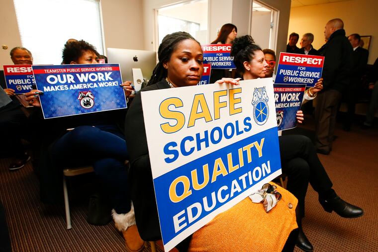 Julia Ward Howe Elementary School principal, Dana Singletary, holds a sign while Philadelphia school principals, vice principals, administrative staff, and local politicians held a press conference speaking out on the asbestos, lead, and mold crisis in Philadelphia schools at the Teamsters Local 502 Commonwealth Association of School Administrators headquarters in North Philadelphia on Thursday, Jan. 30, 2020.