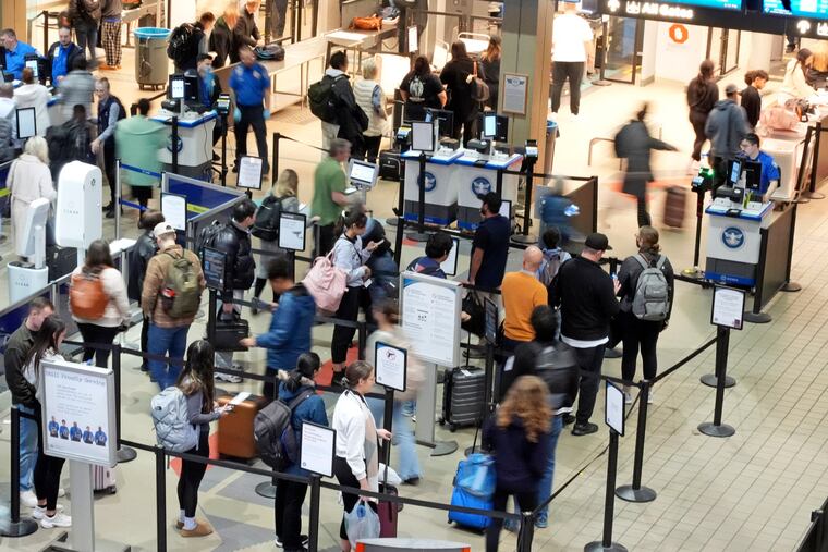 Passengers line up at the security checkpoint in Pittsburgh International Airport earlier this month.