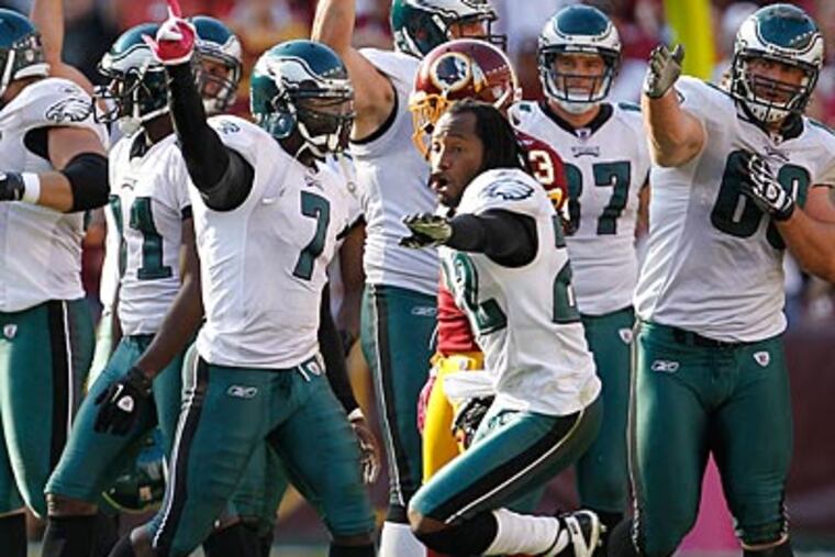 The Eagles celebrate a fourth-quarter first down that sealed a victory over the Redskins. (Ron Cortes/Staff Photographer)