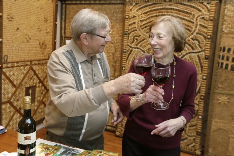 Walter and wife Mary Deuschle have an afternoon glass of wine in his Huntingdon Valley home studio on December 1, 2016.