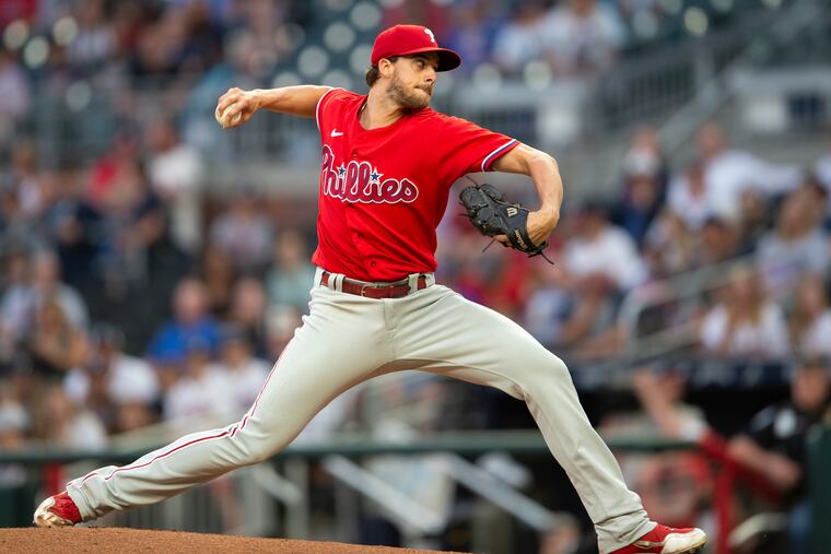 Philadelphia Phillies starting pitcher Aaron Nola throws during the first inning of the team's baseball game against the Atlanta Braves on Thursday, May 26, 2022, in Atlanta. (AP Photo/Hakim Wright Sr.)