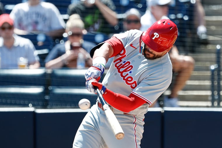 Phillies designated hitter Kyle Schwarber hits a double against the Yankees at George M. Steinbrenner Field in Tampa, Fla.