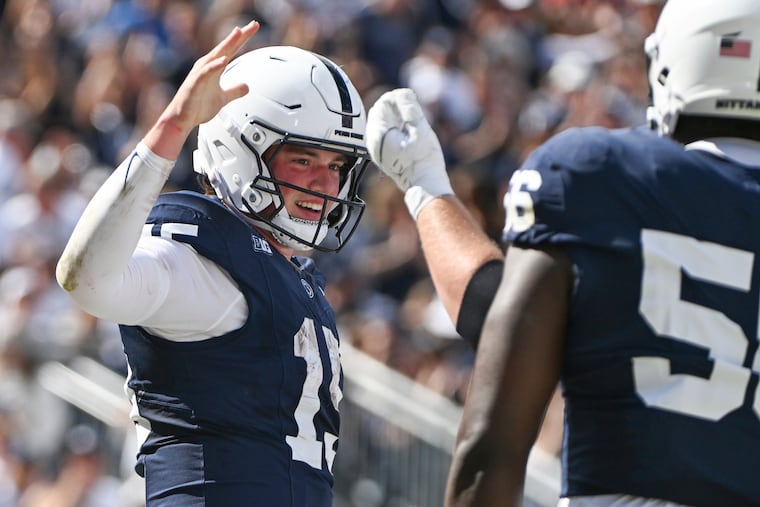 Penn State quarterback Drew Allar (15) celebrates a touchdown during the first half of their win over Big Ten foe UCLA at Beaver Stadium on Saturday.