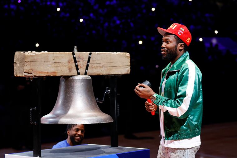 Rapper Meek Mill prepares to ring the ceremonial bell before the Sixers played the Toronto Raptors in game one of the Eastern Conference quarterfinals playoffs on Saturday, April 16, 2022 in Philadelphia.