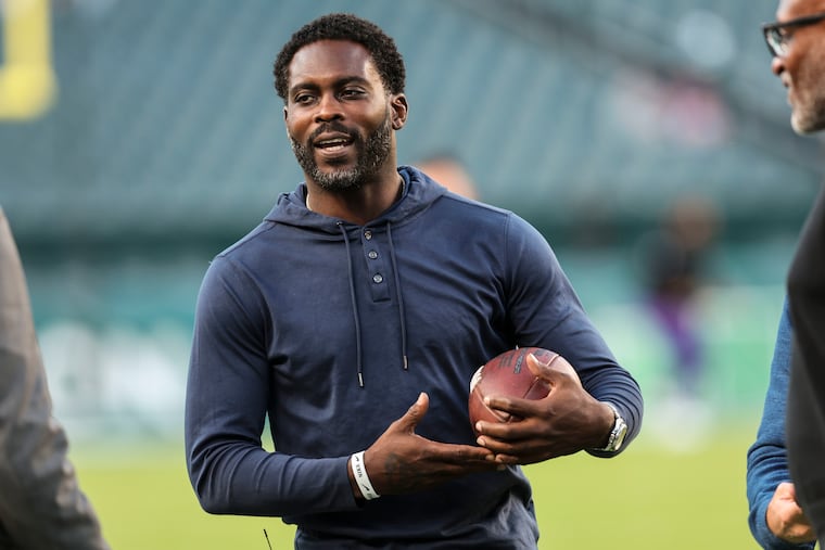 Former Eagles quarterback Michael Vick on the sideline before a game against the Minnesota Vikings at Lincoln Financial Field in September 2023.