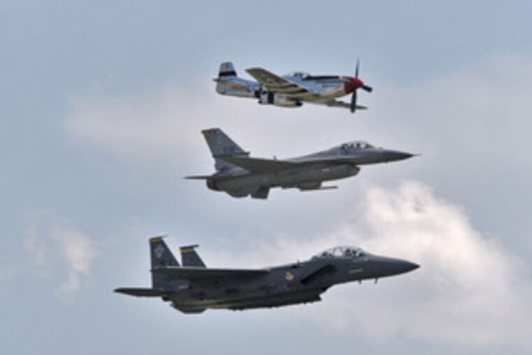 No problem with anachronism here: A WWII-era P-51 Mustang (from top) shares the sky with an F-16 and an F-15 Eagle.