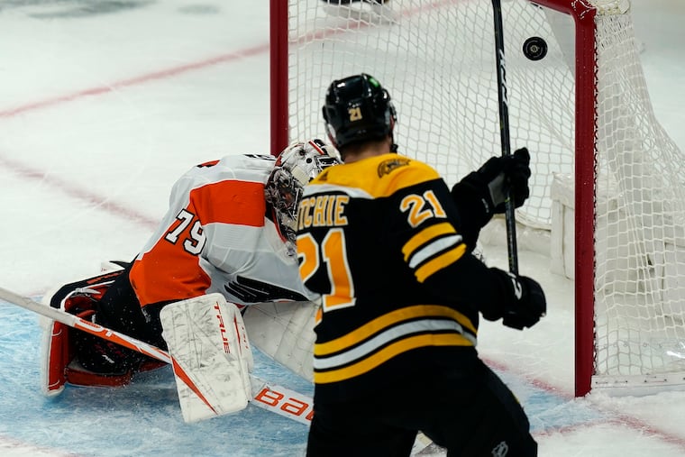 Carter Hart, shown here giving up a goal on Thursday, tied a dubious career high on Saturday by allowing six goals in the Flyers' disappointing 6-1 loss at Boston. Afterward, he was visibly frustrated.