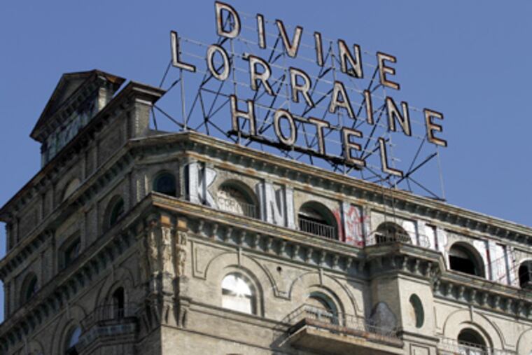 The Divine Lorraine on N. Broad opened in 1894. Many see it as a 10-story barrier to area’s revival. (Michael S. Wirtz / Staff Photographer)