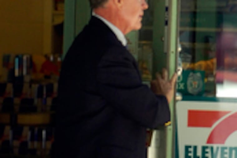 Forrest Smith Marsalis exits store after leaving son's trial.