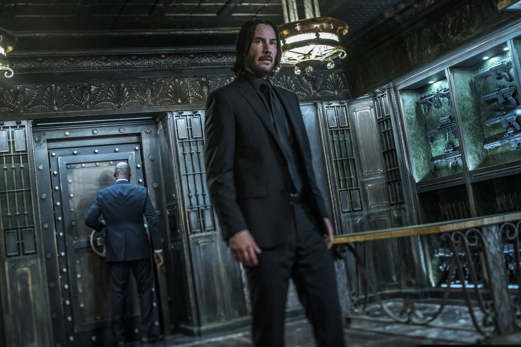 This image released by Lionsgate shows Keanu Reeves in a scene from "John Wick: Chapter 3 - Parabellum." The third installment of the hyper violent Keanu Reeves franchise has taken the top spot at the North American box office and ending the three-week reign of “Avengers: Endgame.” Studios on Sunday, May 19, 2019, say “John Wick: Chapter 3 - Parabellum” has grossed an estimated $57 million in its opening weekend. (Niko Tavernise/Lionsgate via AP)