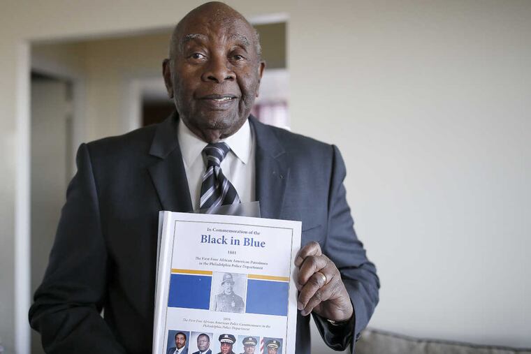 Former Philadelphia Police Chief Inspector Arthur Matthews created a scrapbook chronicling the achievements of black police officers in Philadelphia that he's titled "Black in Blue." Matthews is seen in his home in Philadelphia, PA on Jan. 25, 2017.