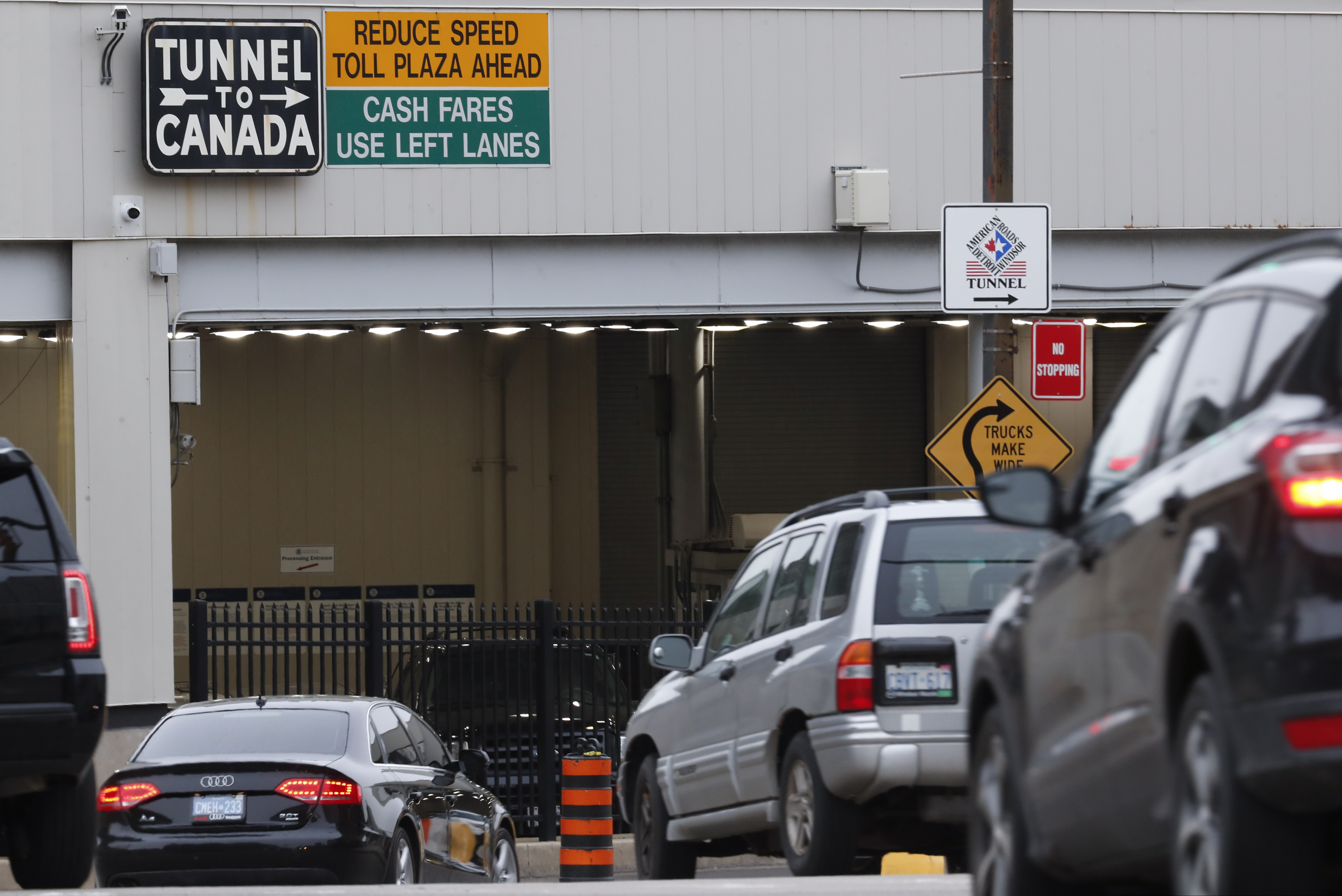 In this March 16, 2020 photo, vehicles entered the Detroit-Windsor Tunnel in Detroit to travel to Canada.