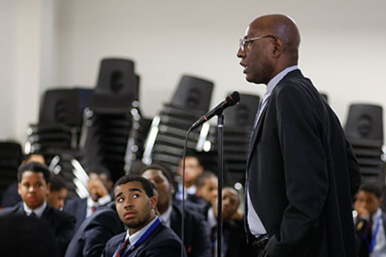 David Hardy, CEO of Boys' Latin Charter School of Philadelphia, talks to students about the knifing and fight Friday during a school assembly. (Michael S. Wirtz / Staff Photographer)