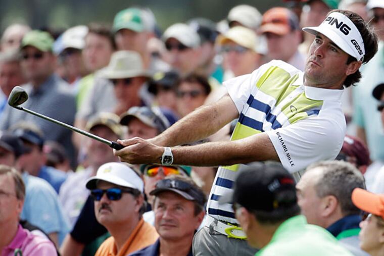 Bubba Watson watches his shot out of the gallery on the 18th hole during the second round of the Masters golf tournament Friday, April 11, 2014, in Augusta, Ga. (Darron Cummings/AP)