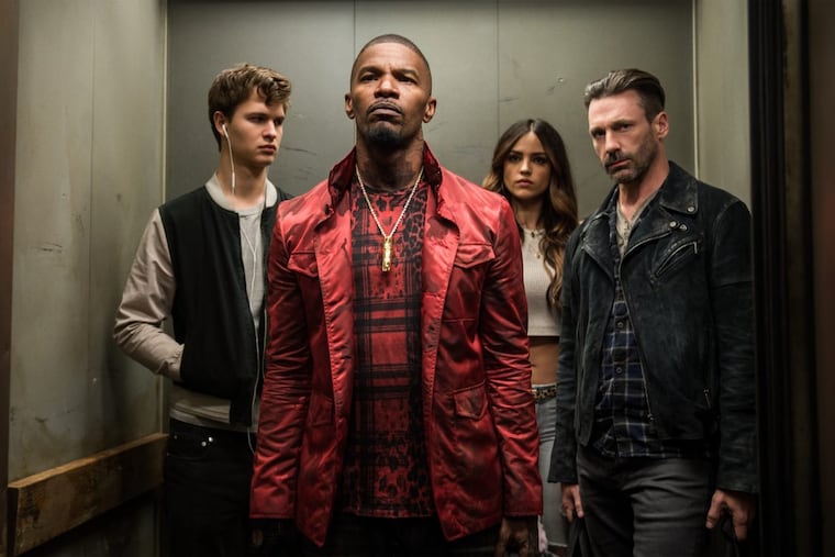 "BABY DRIVER": Jamie Foxx is Bats (front), with (rear, from left) Ansel Elgort as Baby, Eiza Gonzalez as Darling, and Jon Hamm as Buddy. (Photo: Wilson Webb / Sony Pictures)