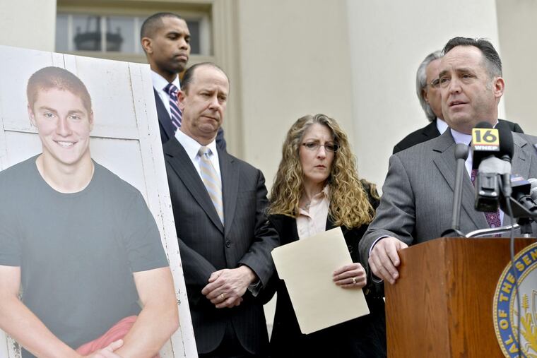 Senate Majority Leader Jake Corman, R-Benner Township, speaks out front of the Centre County Courthouse to introduce anti-hazing legislation named after Timothy Piazza. Jim and Evelyn Piazza stood with Corman. (Abby Drey/Centre Daily Times/TNS)